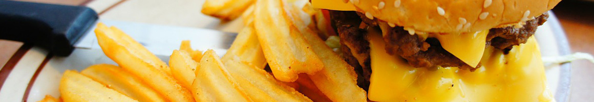 Eating American (New) Burger at Freddy's Frozen Custard & Steakburgers restaurant in Omaha, NE.